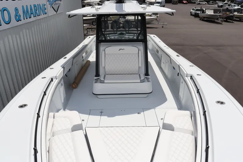 Slide: The Image of 2024 Yellowfin 39 Offshore boat with spacious deck and luxurious seating. - 7