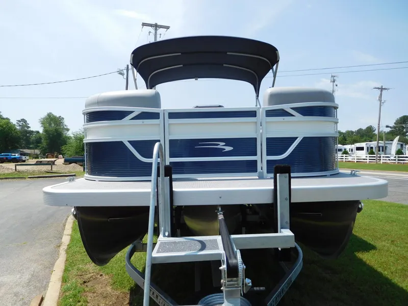 Slide: The Image of 2024 Bennington 22 SSB pontoon boat, rear view, on a trailer. - 2