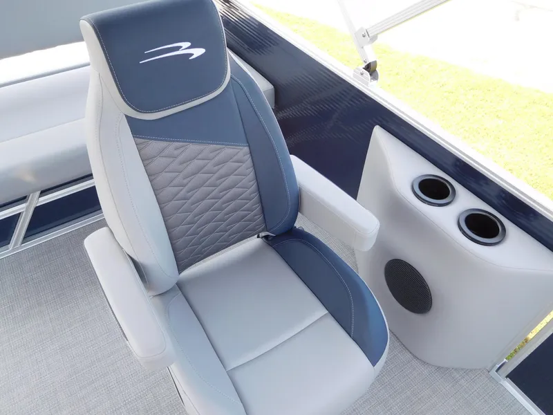 Slide: The Image of 2024 Bennington 22 SSB boat seat with cup holders and speaker. - 5