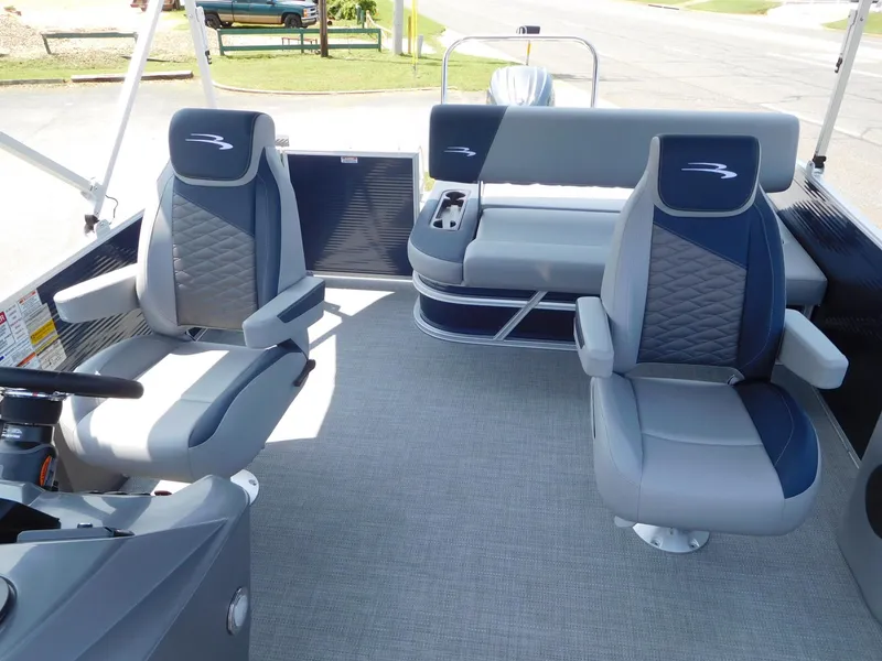 Slide: The Image of 2024 Bennington 22 SSB boat interior with grey and blue seating. - 6
