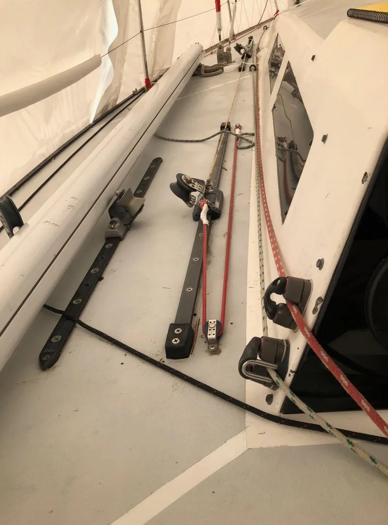 Slide: The Image of Deck of 1991 Tripp 36 sailboat with rigging and ropes. - 28