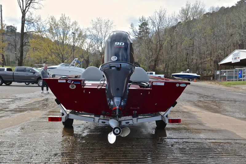 Slide: The Image of 2019 G3 Sportsman 1710 boat on trailer at a boat launch. - 13