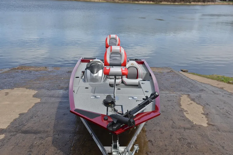 Slide: The Image of 2019 G3 Sportsman 1710 fishing boat at a lakeside launch. - 17