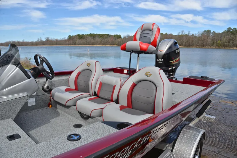 Slide: The Image of 2019 G3 Sportsman 1710 fishing boat with Yamaha motor on a lake. - 18