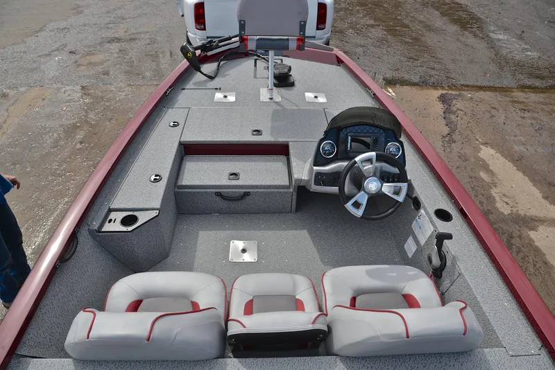 Slide: The Image of 2019 G3 Sportsman 1710 boat interior with steering console and seating. - 20