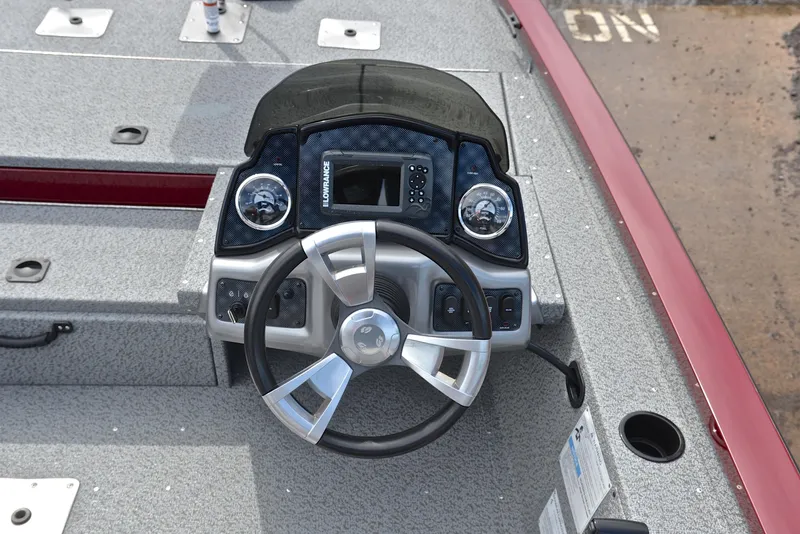Slide: The Image of 2019 G3 Sportsman 1710 boat dashboard with steering wheel and control panel. - 24
