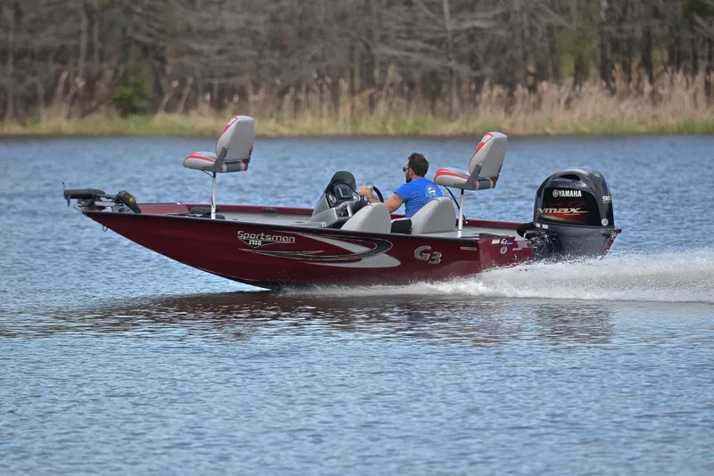 Slide: The Image of 2019 G3 Sportsman 1710 boat speeding on a lake with Yamaha outboard motor. - 4