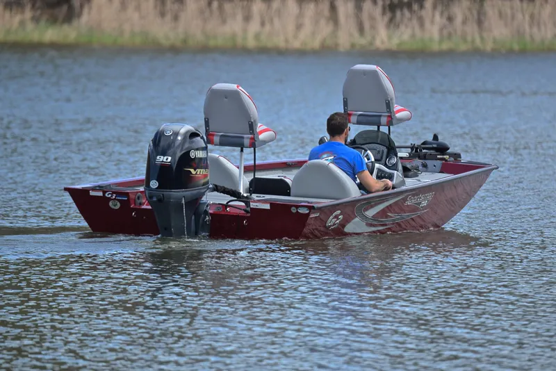 Slide: The Image of 2019 G3 Sportsman 1710 boat with Yamaha 90 engine on a lake. - 8