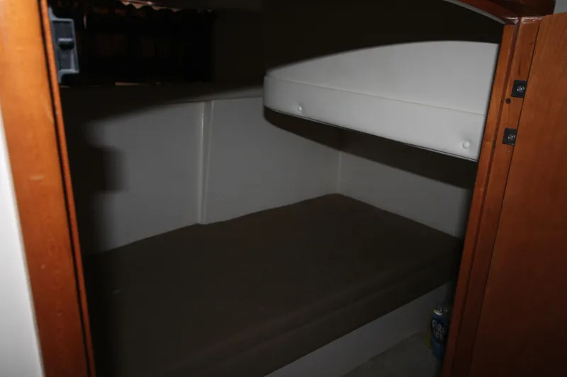 Slide: The Image of 2001 Carver 466 Motor Yacht interior cabin with bed - 28