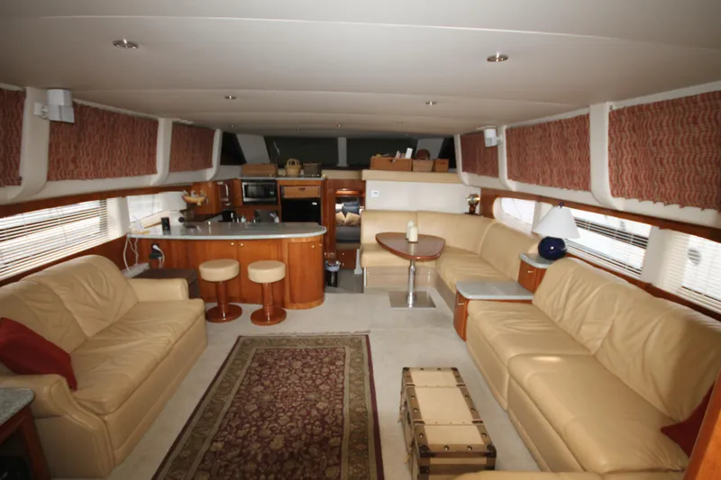 Slide: The Image of Luxurious interior of a 2001 Carver 466 Motor Yacht with leather seating and modern amenities. - 3