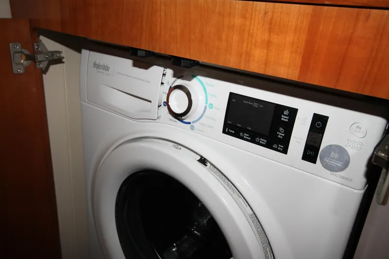 Slide: The Image of Washing machine in the 2001 Carver 466 Motor Yacht laundry area. - 40