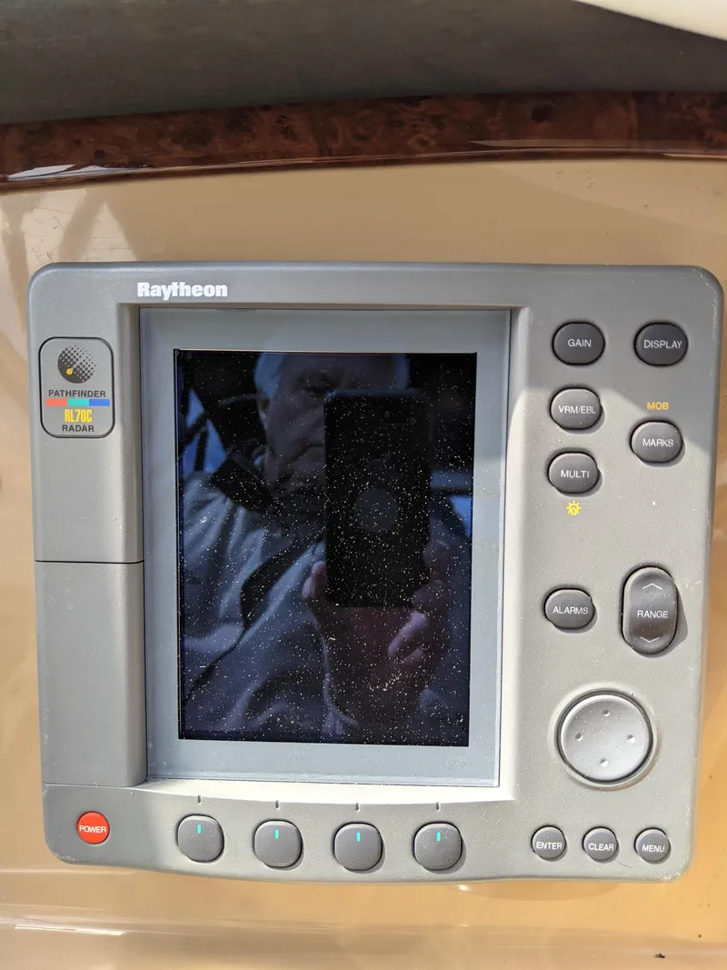 Slide: The Image of Raytheon navigation system on a 2001 Carver 466 Motor Yacht. - 46