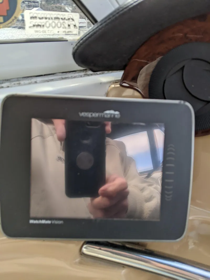 Slide: The Image of Close-up of a Vesper Marine WatchMate Vision on a 2001 Carver 466 Motor Yacht. - 48