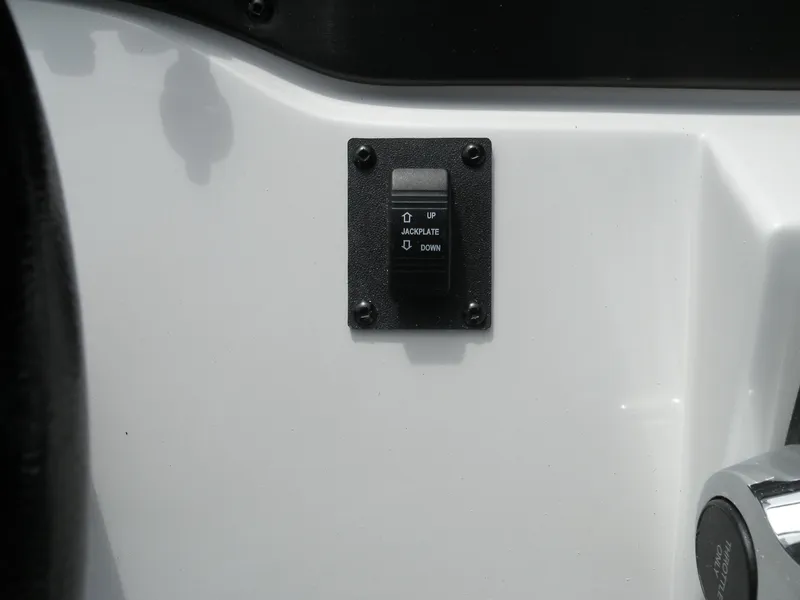 Slide: The Image of 2024 Ranger RB210 boat control panel with up/down switch. - 7
