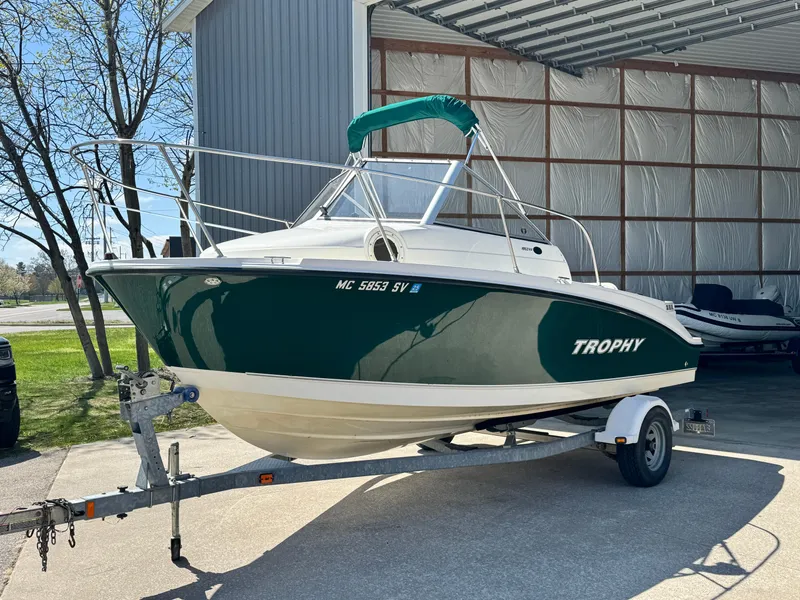Slide: The Image of 2005 Trophy 1952 Walkaround boat on trailer in outdoor storage. - 0
