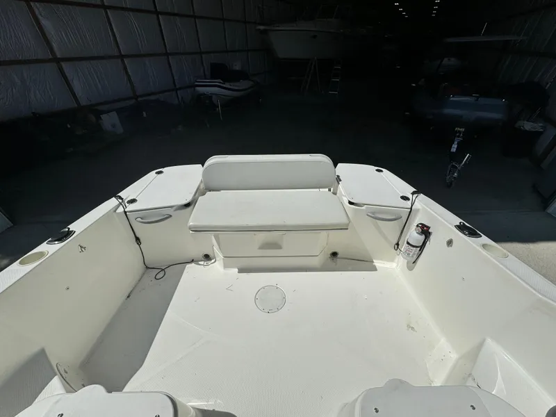Slide: The Image of 2005 Trophy 1952 Walkaround boat interior with seating and storage compartments. - 14