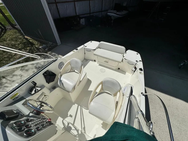 Slide: The Image of 2005 Trophy 1952 Walkaround boat interior with seating and control panel. - 16