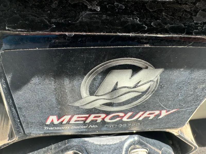 Slide: The Image of Mercury engine logo on a 2005 Trophy 1952 Walkaround boat. - 21