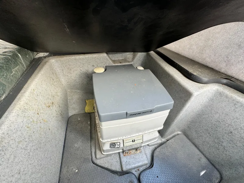 Slide: The Image of Battery compartment of a 2005 Trophy 1952 Walkaround boat. - 34