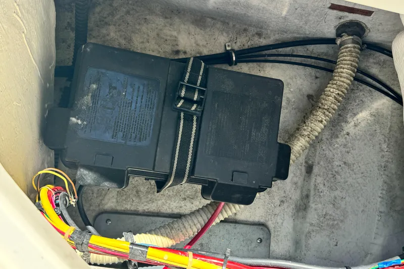 Slide: The Image of Battery compartment of a 2005 Trophy 1952 Walkaround boat with secured wiring. - 38