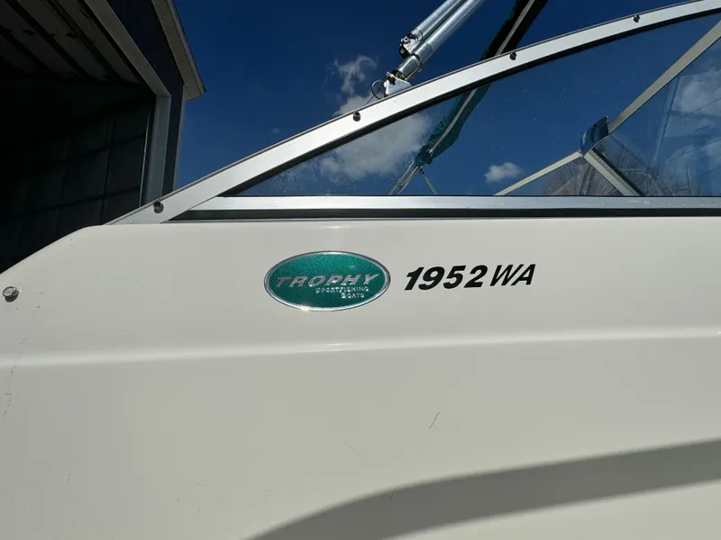 Slide: The Image of Close-up of a 2005 Trophy 1952 Walkaround boat with logo and model name. - 4