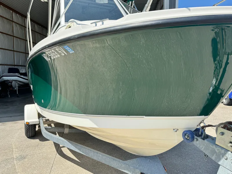 Slide: The Image of 2005 Trophy 1952 Walkaround boat on trailer in storage. - 7