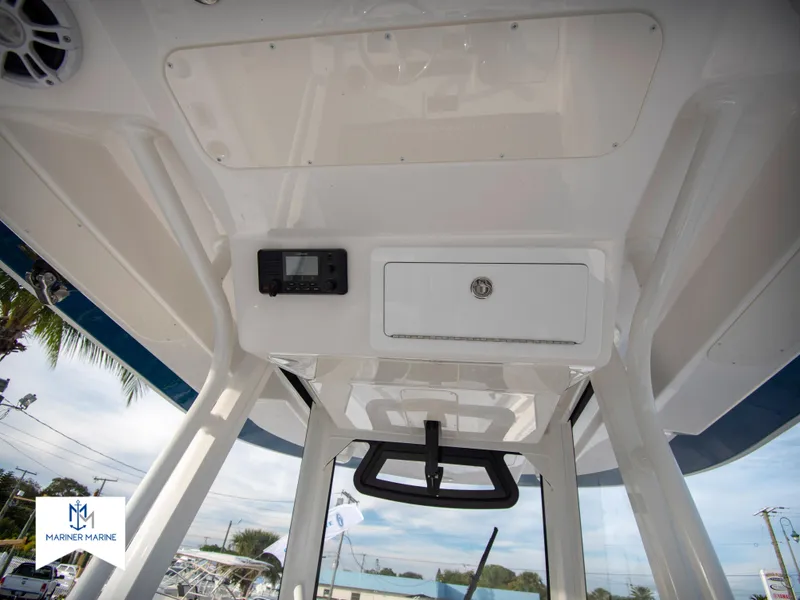 Slide: The Image of 2024 Regulator 31 boat console with storage compartment and electronic display. - 29