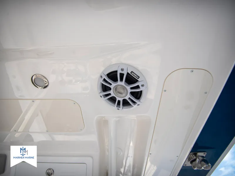 Slide: The Image of 2024 Regulator 31 boat interior with speaker and control panel. - 30