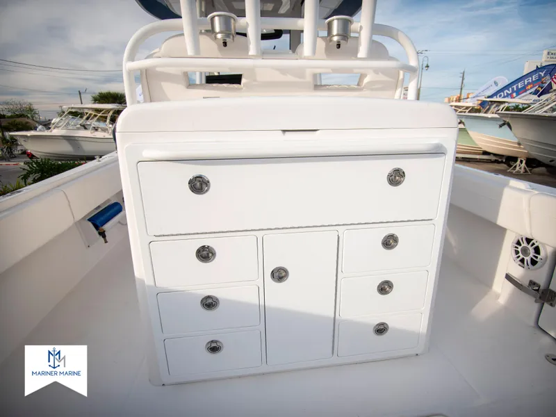 Slide: The Image of 2024 Regulator 31 boat storage compartments and seating area - 37