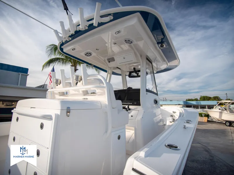 Slide: The Image of 2024 Regulator 31 boat with center console and modern amenities. - 9