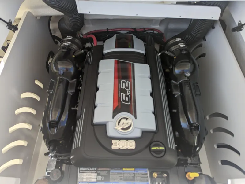 Slide: The Image of 2024 Sea Ray SPX 230 boat engine compartment with 6.2L 300 HP MerCruiser engine. - 22