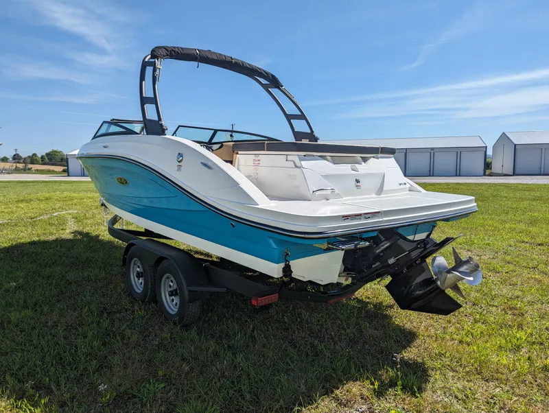 Slide: The Image of 2024 Sea Ray SPX 230 boat on trailer, rear view. - 3