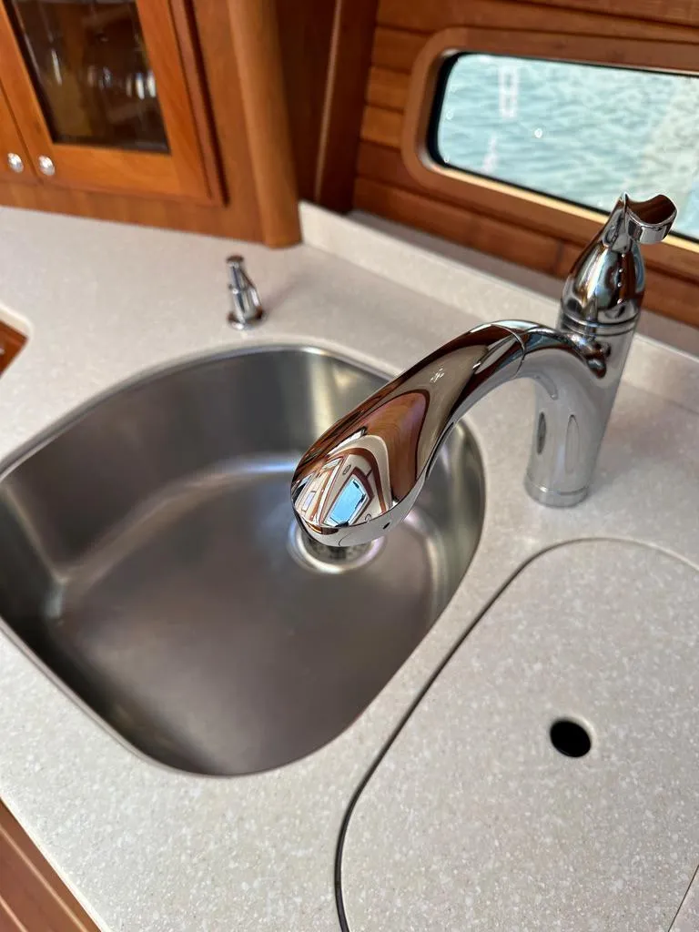 Slide: The Image of 2012 Sabre 48 Salon Express kitchen sink and faucet detail - 21