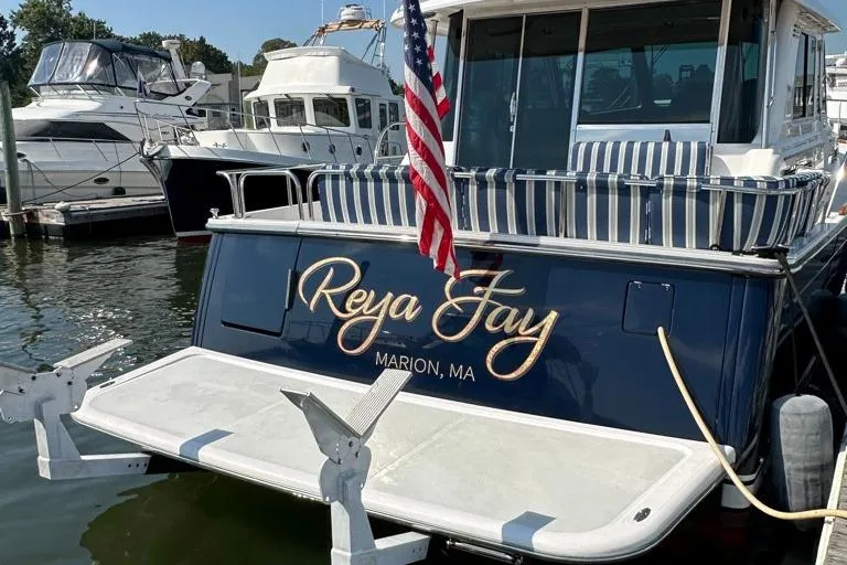 Slide: The Image of 2012 Sabre 48 Salon Express yacht docked, named Reya Jay in Marion, MA. - 7