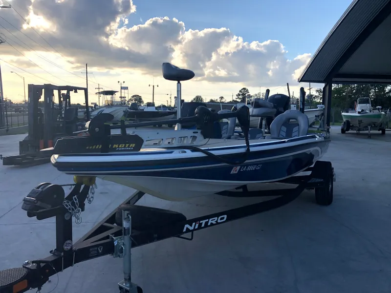 Slide: The Image of 2019 Nitro Z18 boat on trailer at sunset. - 1