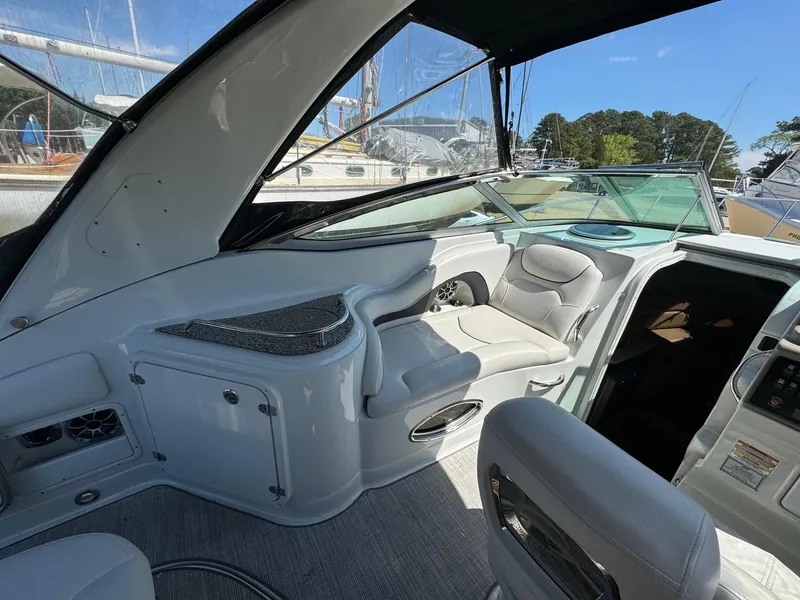 Slide: The Image of 2020 Crownline 264CR boat interior with plush seating and modern design. - 28