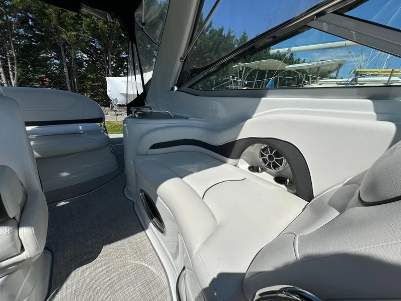 Slide: The Image of 2020 Crownline 264CR boat interior with sleek seating and modern design. - 36