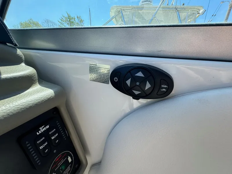 Slide: The Image of 2020 Crownline 264CR boat interior controls and dashboard detail. - 41