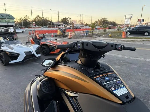 Slide: The Image of 2024 Yamaha Marine Waverunner FX LIMITED SVHO in black and copper, rear view. - 12