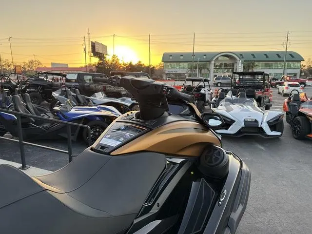 Slide: The Image of 2024 Yamaha Marine Waverunner FX LIMITED SVHO dashboard, black and copper design, advanced controls. - 5