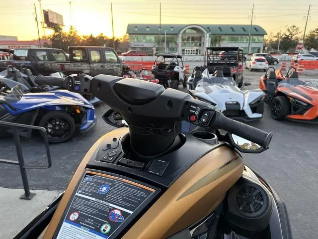 Slide: The Image of 2024 Yamaha Marine Waverunner FX LIMITED SVHO storage compartment, black and copper design. - 6