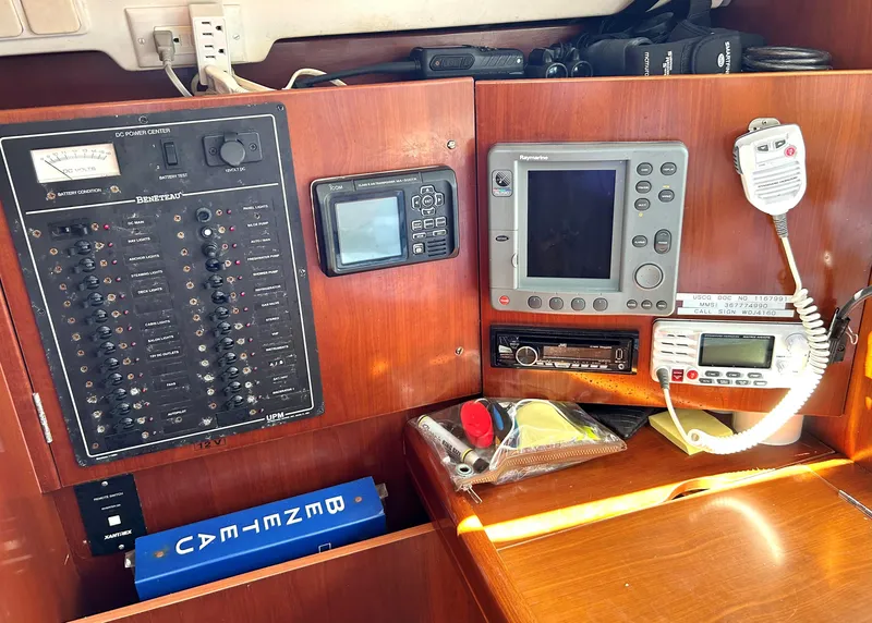 Slide: The Image of Control panel and navigation equipment on a 2005 Beneteau 423 sailboat. - 16