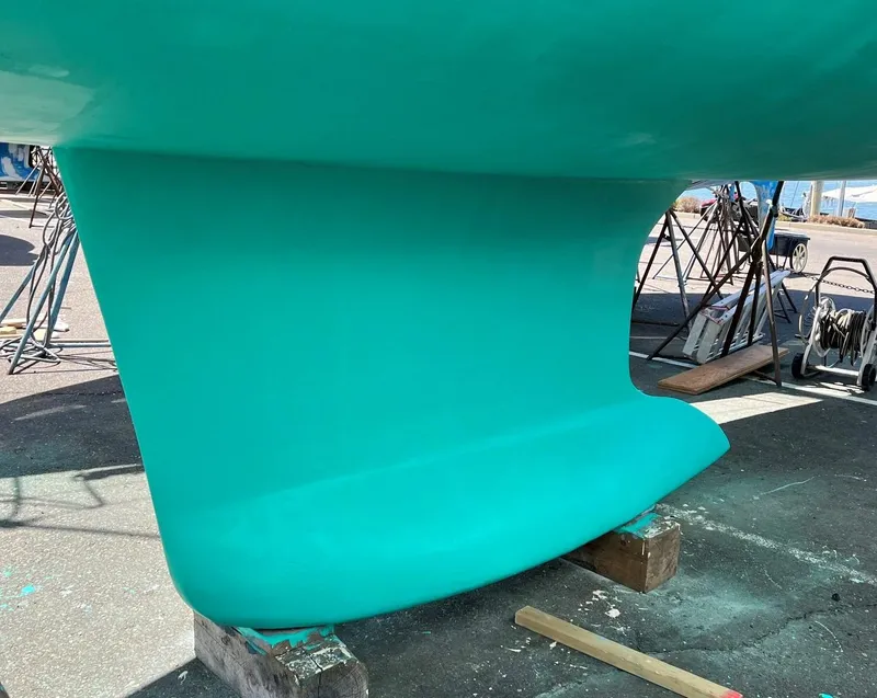 Slide: The Image of Close-up of a 2005 Beneteau 423 sailboat keel in a boatyard. - 26