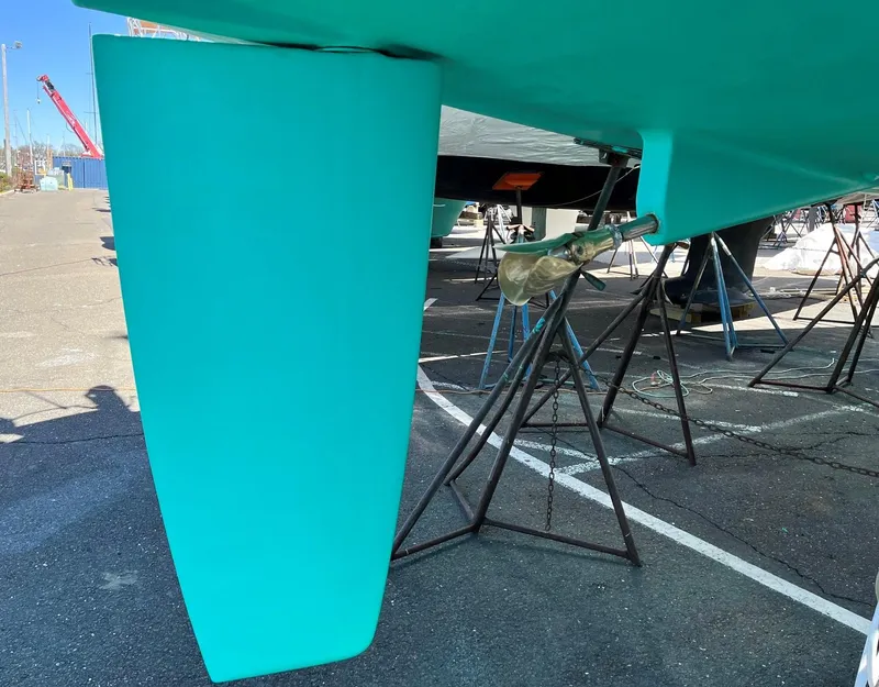 Slide: The Image of Beneteau 423 sailboat keel and propeller, 2005 model, on dry dock. - 27