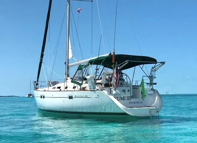 Slide: The Image of Beneteau 423 sailboat, 2005 model, anchored in clear turquoise waters. - 3
