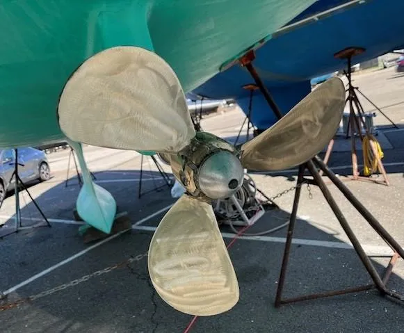 Slide: The Image of Propeller of a 2005 Beneteau 423 sailboat on dry dock. - 30