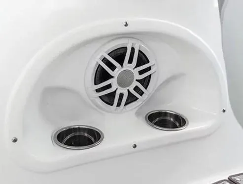 Slide: The Image of 2024 NauticStar 193SC Sport Deck speaker and cup holders on white panel. - 8