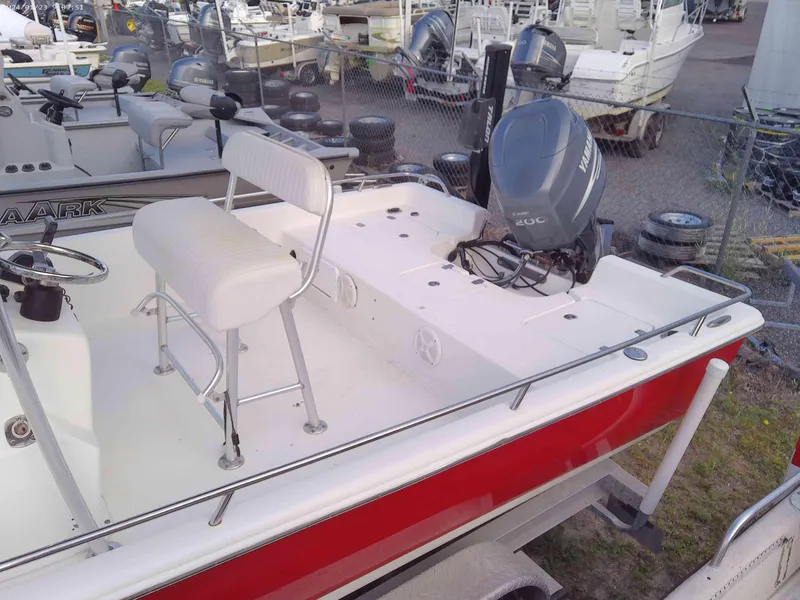 Slide: The Image of 2008 Clearwater 2400 Baystar Bay Boat with Yamaha outboard motor in a marina. - 5