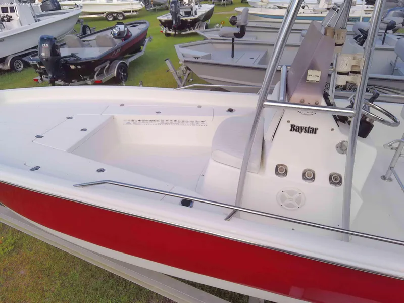 Slide: The Image of 2008 Clearwater 2400 Baystar Bay Boat with red and white exterior. - 6