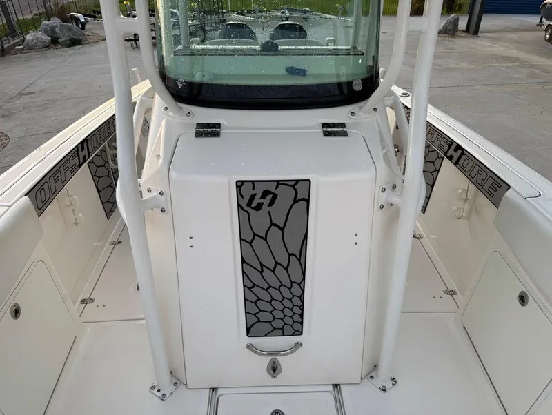 Slide: The Image of 2019 Wellcraft 262 Fisherman boat, center console view, sleek design, outdoor setting. - 19